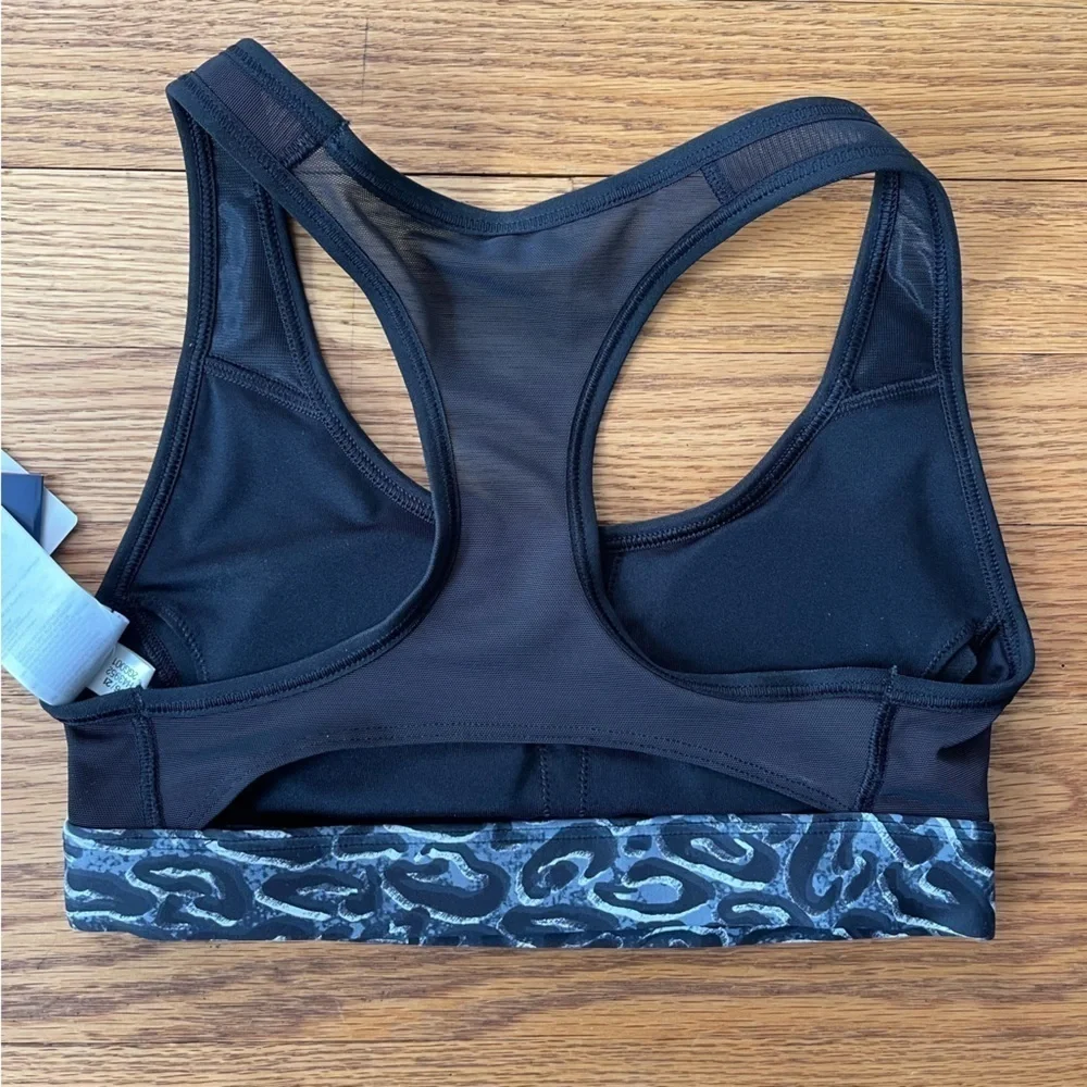 NEW Reebok TS Lux Racerback Sports Bra Leopard Black Size XS NWT